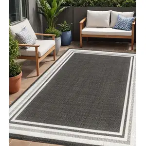 Photo of Black And Cream Striped Indoor Outdoor Area Rug