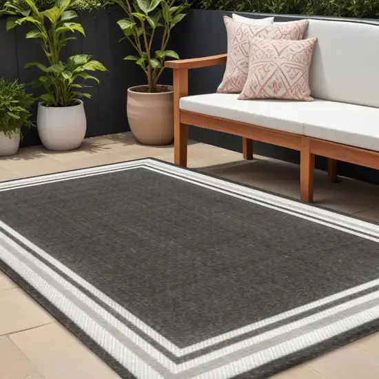 Black And Cream Striped Indoor Outdoor Area Rug Photo 1
