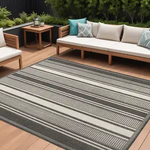 Photo of Black And Cream Striped Indoor Outdoor Area Rug