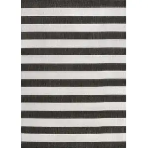 Photo of Black And Cream Striped Indoor Outdoor Area Rug