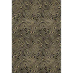Photo of Black And Gold Abstract Washable Area Rug With UV Protection