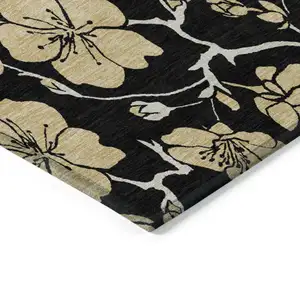 Photo of Black And Gold Floral Washable Indoor Outdoor Area Rug