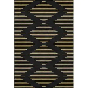 Photo of Black And Gold Geometric Washable Area Rug With UV Protection