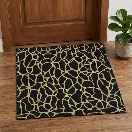Black And Gold Geometric Washable Area Rug With UV Protection Photo 1