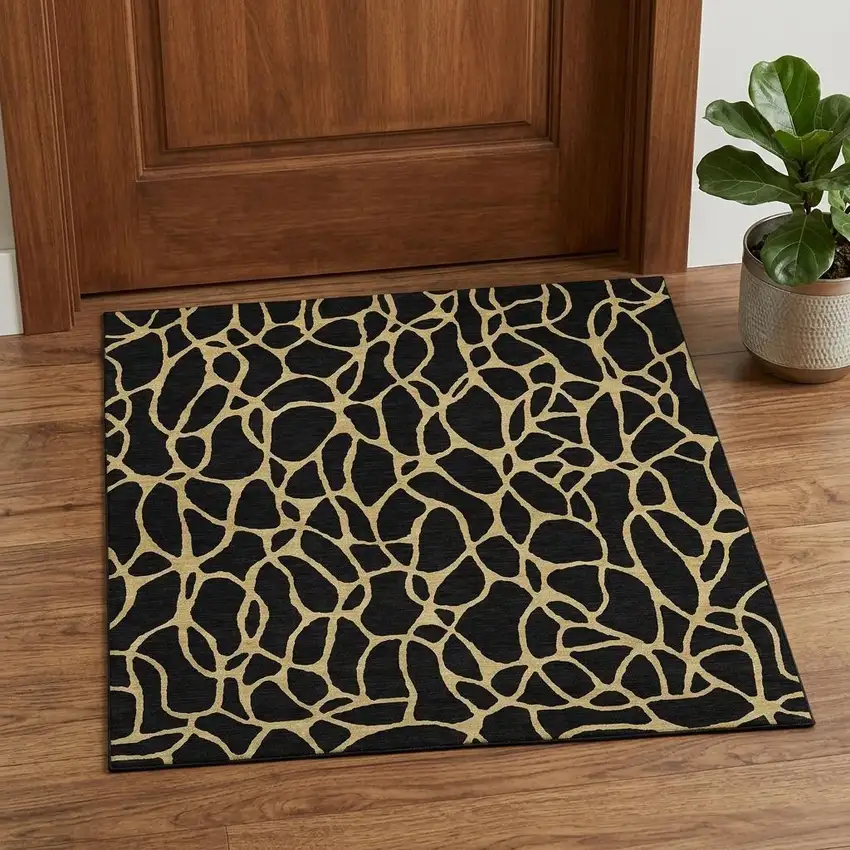 Black And Gold Geometric Washable Area Rug With UV Protection Photo 1