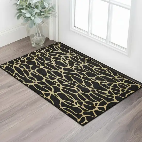 Black And Gold Geometric Washable Area Rug With UV Protection Photo 2