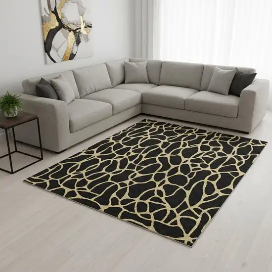 Black And Gold Geometric Washable Area Rug With UV Protection Photo 2