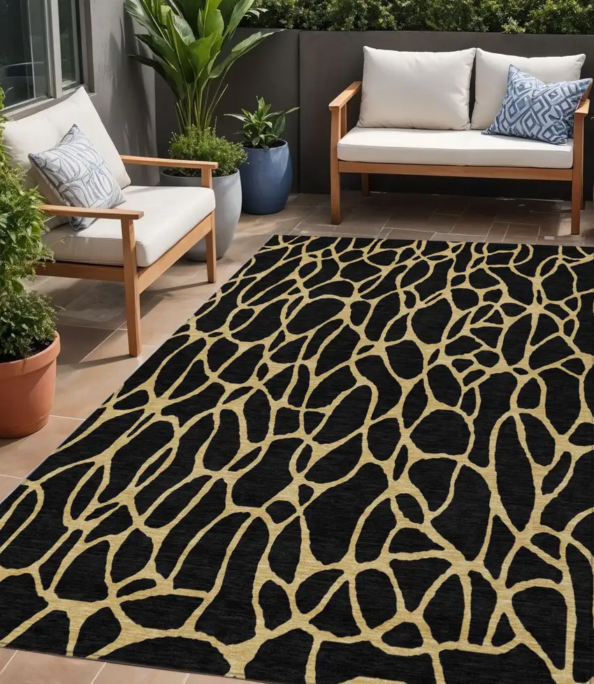 Black And Gold Geometric Washable Indoor Outdoor Area Rug Photo 1