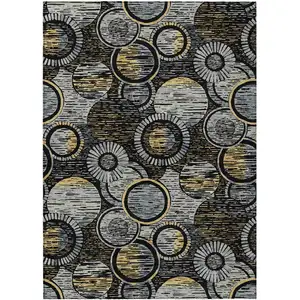Photo of Black And Gold Geometric Washable Indoor Outdoor Area Rug