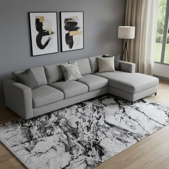 Black And Gray Abstract Area Rug With Fringe Photo 1