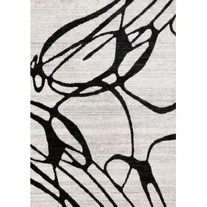 Photo of Black And Gray Abstract Area Rug