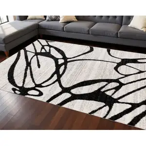 Photo of Black And Gray Abstract Area Rug