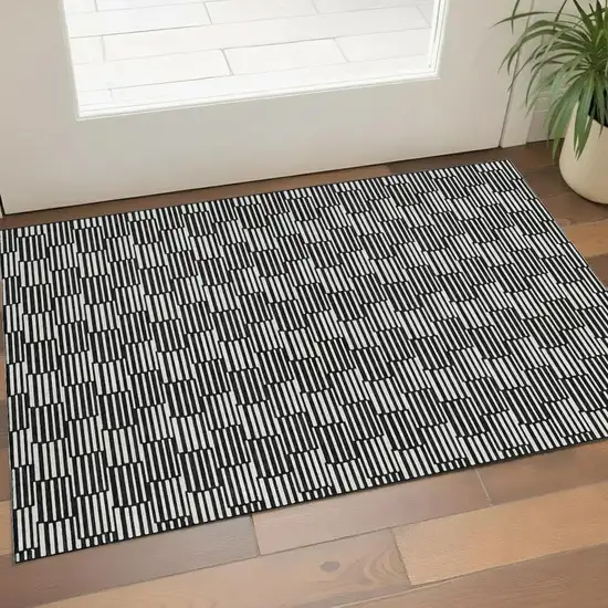 Black And Gray Abstract Geometric Washable Area Rug With UV Protection Photo 1