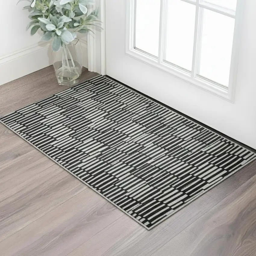 Black And Gray Abstract Geometric Washable Area Rug With UV Protection Photo 2