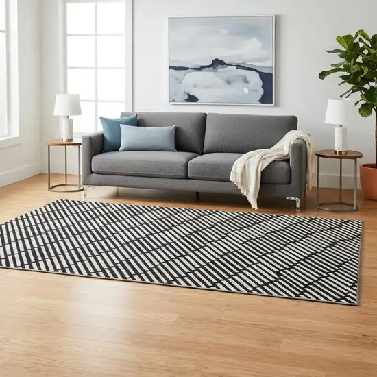 Black And Gray Abstract Geometric Washable Area Rug With UV Protection Photo 2
