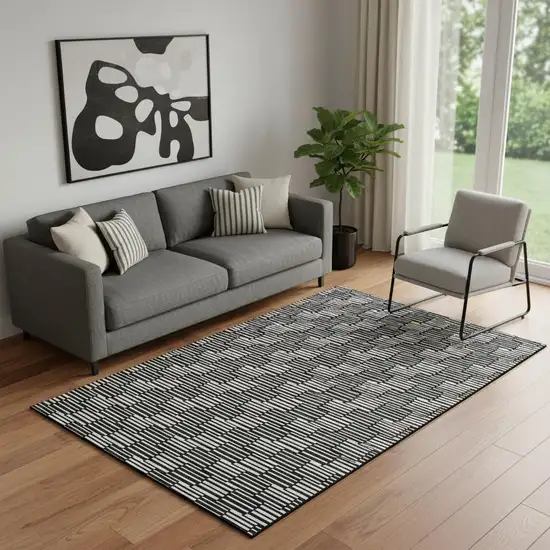 Black And Gray Abstract Geometric Washable Area Rug With UV Protection Photo 1