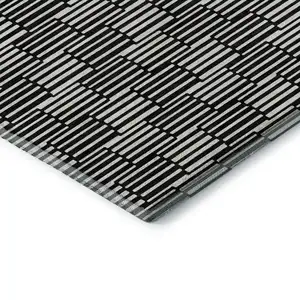 Photo of Black And Gray Abstract Geometric Washable Area Rug With UV Protection