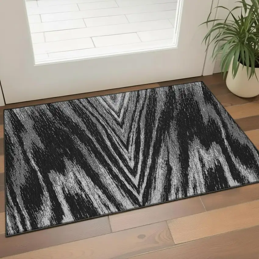 Black And Gray Abstract Washable Area Rug With UV Protection Photo 1