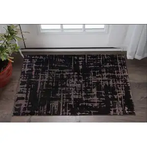 Photo of Black And Gray Abstract Washable Area Rug