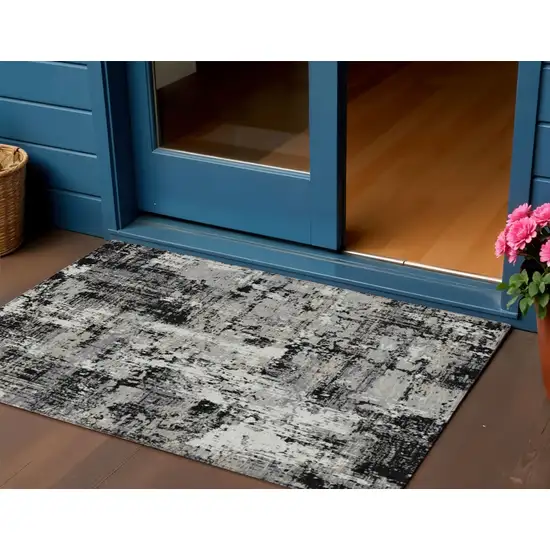 Black And Gray Abstract Washable Indoor Outdoor Area Rug Photo 1