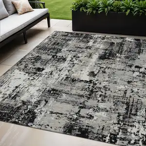 Photo of Black And Gray Abstract Washable Indoor Outdoor Area Rug