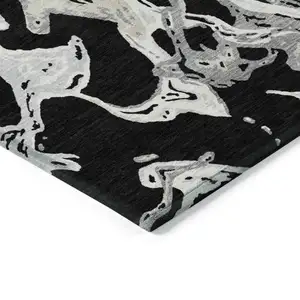 Photo of Black And Gray Abstract Washable Indoor Outdoor Area Rug