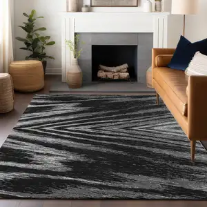 Photo of Black And Gray Abstract Washable Indoor Outdoor Area Rug