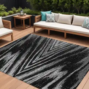 Photo of Black And Gray Abstract Washable Indoor Outdoor Area Rug