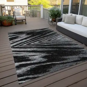 Photo of Black And Gray Abstract Washable Indoor Outdoor Area Rug