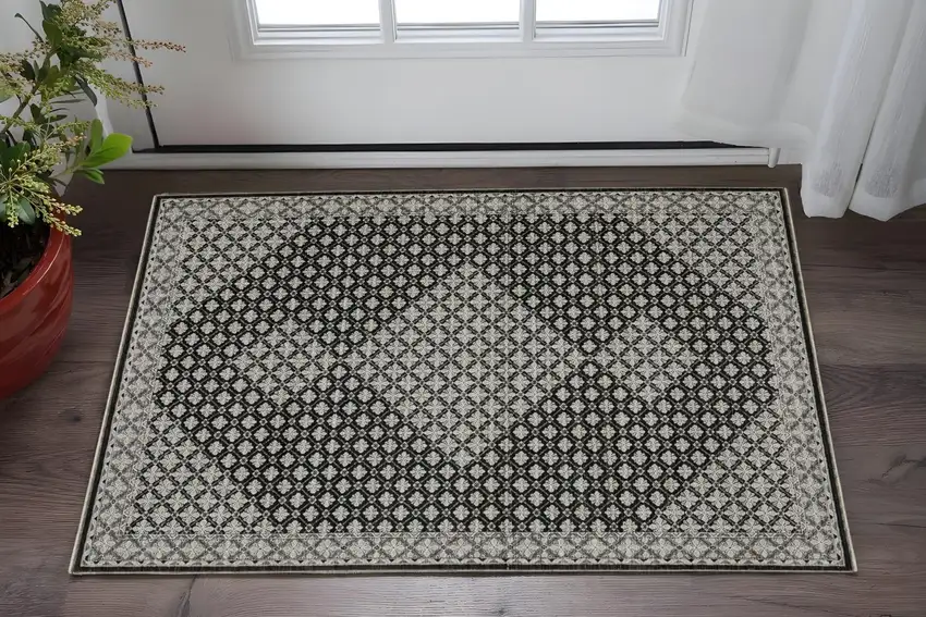 Black And Gray Diamond Area Rug With Fringe Photo 1