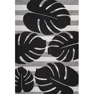 Photo of Black And Gray Floral Indoor Outdoor Area Rug