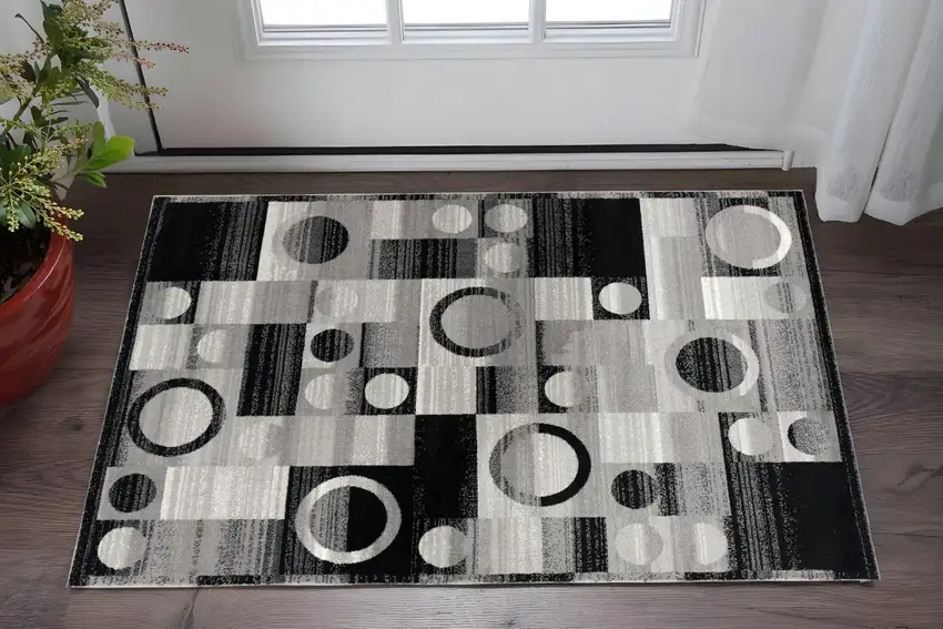 Black And Gray Geometric Area Rug Photo 1