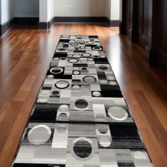 Black And Gray Geometric Area Rug Photo 1