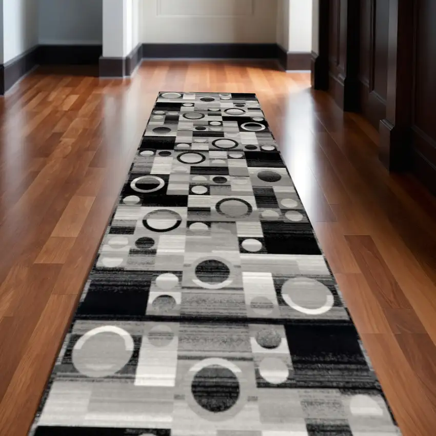 Black And Gray Geometric Area Rug Photo 1