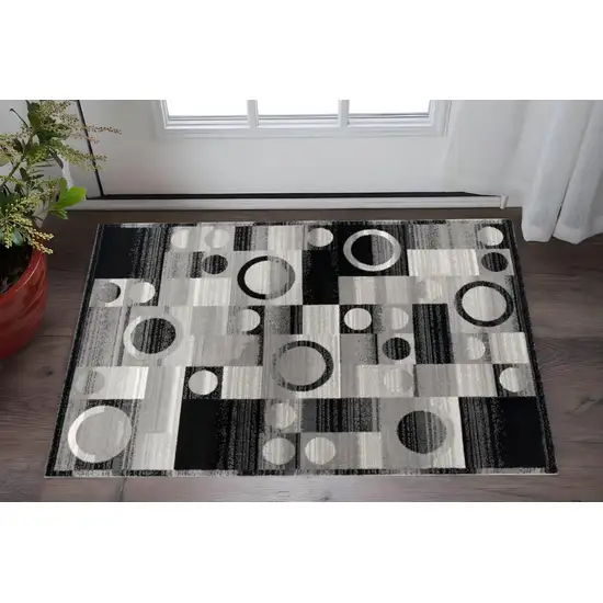 Black And Gray Geometric Area Rug Photo 1