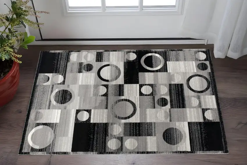 Black And Gray Geometric Area Rug Photo 1