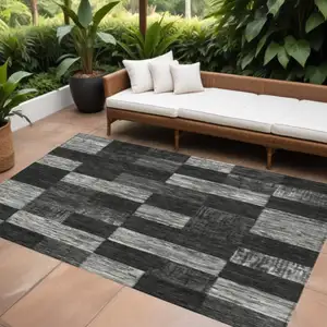 Photo of Black And Gray Geometric Washable Indoor Outdoor Area Rug