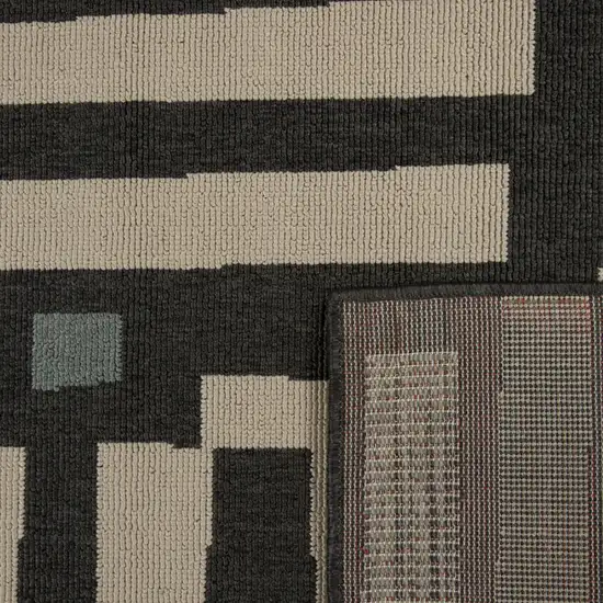 Black And Ivory Abstract Area Rug Photo 9