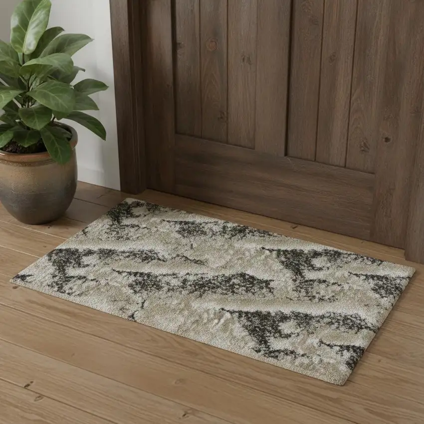 Black And Ivory Abstract Area Rug Photo 1