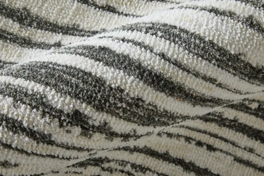 Black And Ivory Abstract Area Rug Photo 9