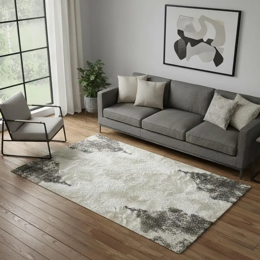 Black And Ivory Abstract Area Rug Photo 1