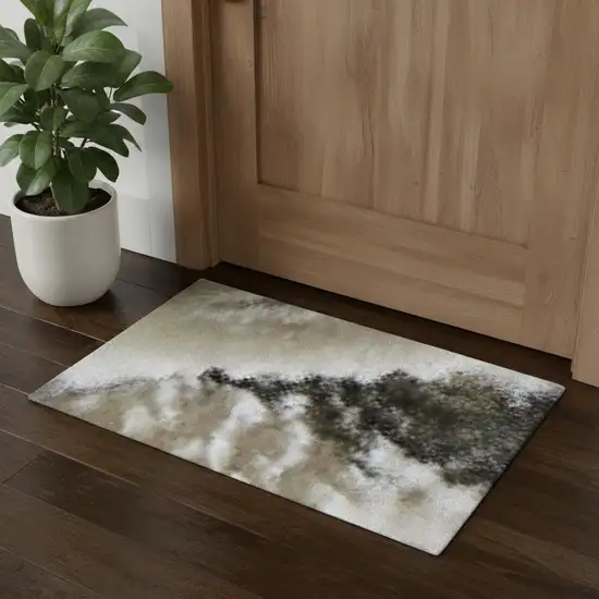 Black And Ivory Abstract Area Rug Photo 1