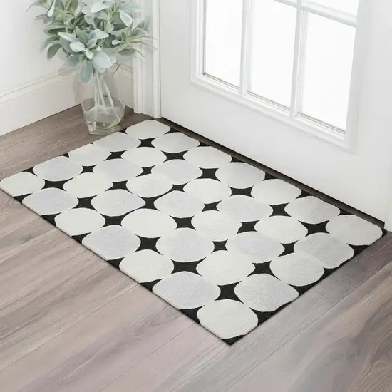 Black And Ivory Abstract Geometric Washable Area Rug With UV Protection Photo 1