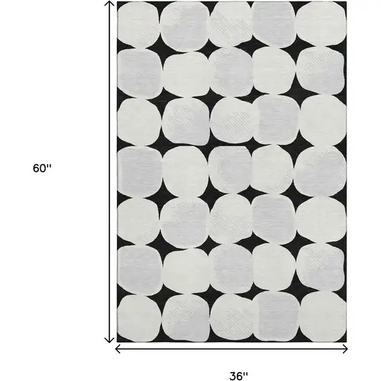 Black And Ivory Abstract Geometric Washable Area Rug With UV Protection Photo 3