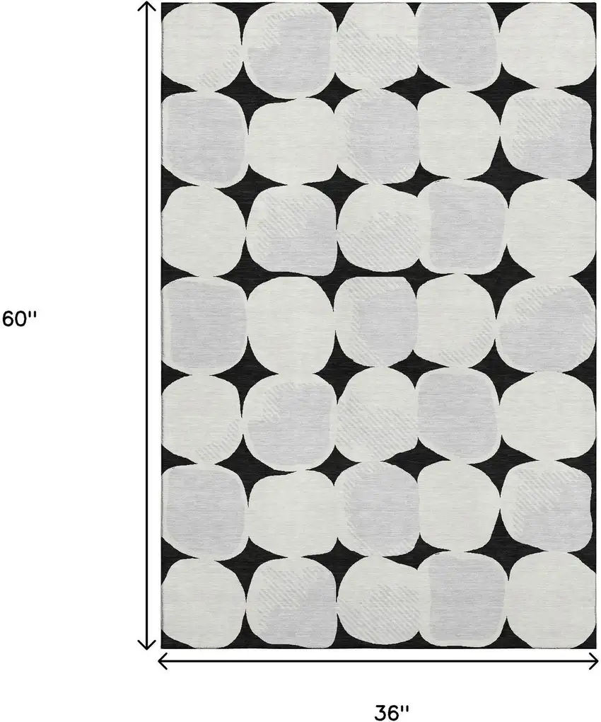 Black And Ivory Abstract Geometric Washable Area Rug With UV Protection Photo 3