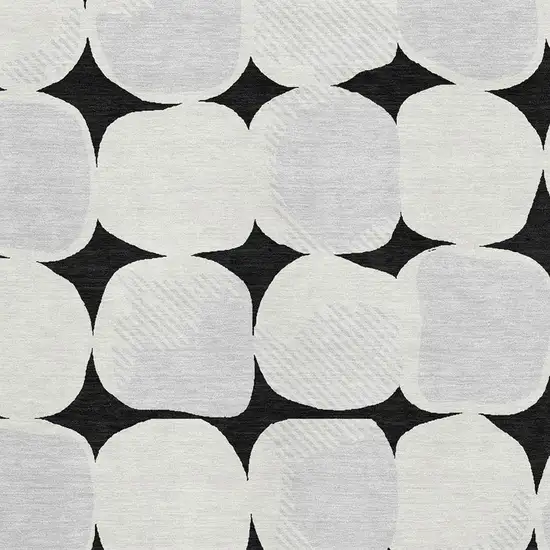Black And Ivory Abstract Geometric Washable Area Rug With UV Protection Photo 3
