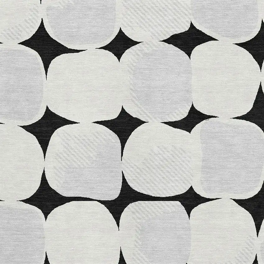 Black And Ivory Abstract Geometric Washable Area Rug With UV Protection Photo 3