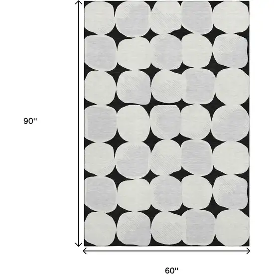 Black And Ivory Abstract Geometric Washable Area Rug With UV Protection Photo 7