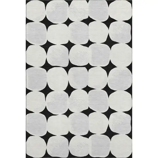 Black And Ivory Abstract Geometric Washable Area Rug With UV Protection Photo 1