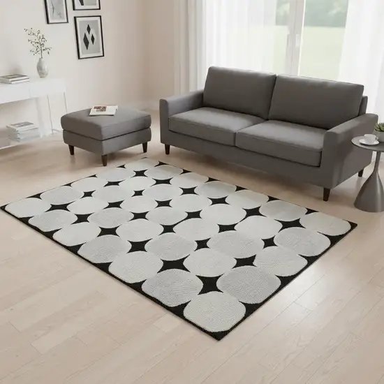 Black And Ivory Abstract Geometric Washable Area Rug With UV Protection Photo 2